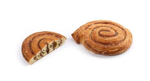 Frozen cinnamon swirl pastry with cinnamon-sugar filling and decorative swirl.